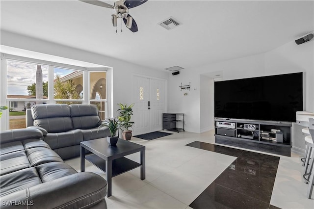 living room with ceiling fan