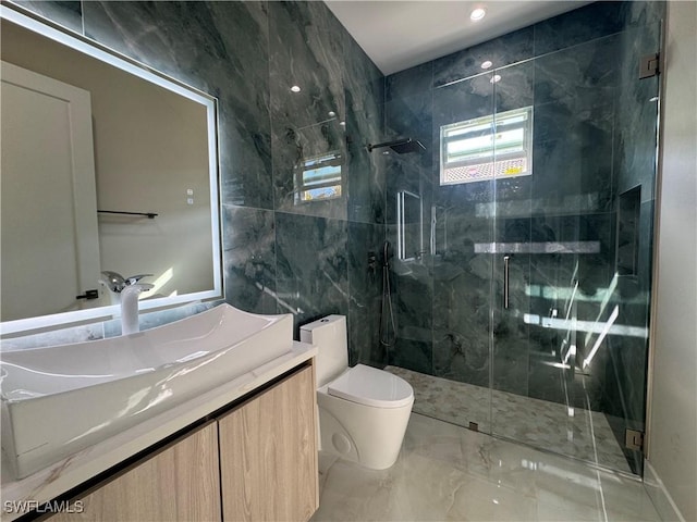 bathroom with vanity, tile walls, an enclosed shower, and toilet