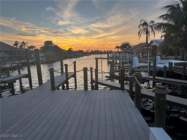 view of dock featuring a water view and boat lift