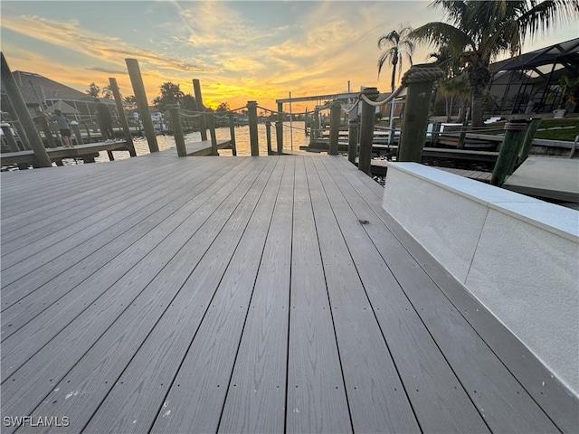 wooden terrace featuring a boat dock