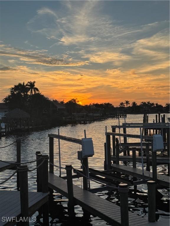 view of dock with a water view