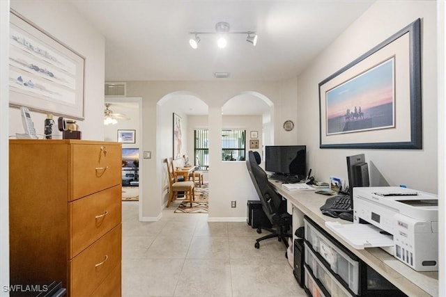 tiled office featuring ceiling fan and rail lighting