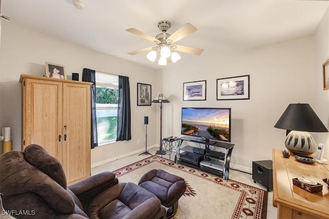 living room featuring ceiling fan