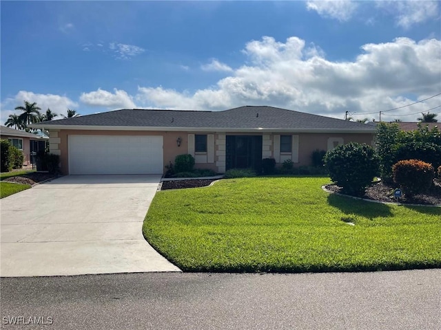 ranch-style home with a garage and a front lawn