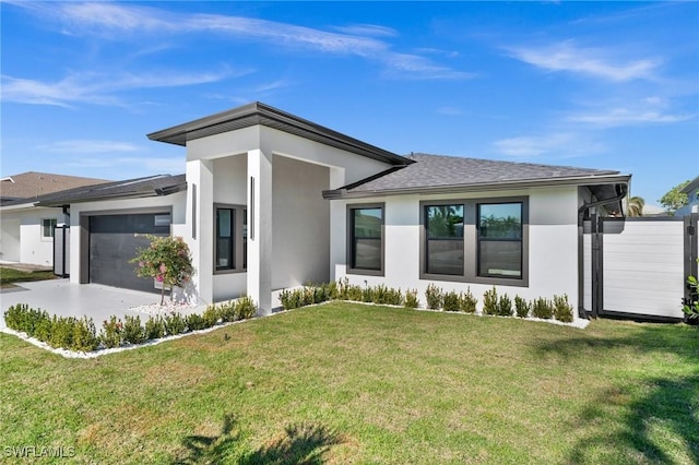 exterior space with a garage and a front yard