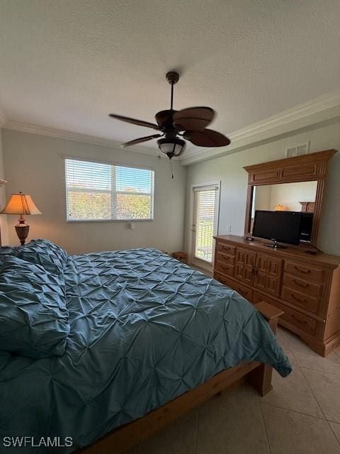 tiled bedroom featuring ceiling fan and ornamental molding