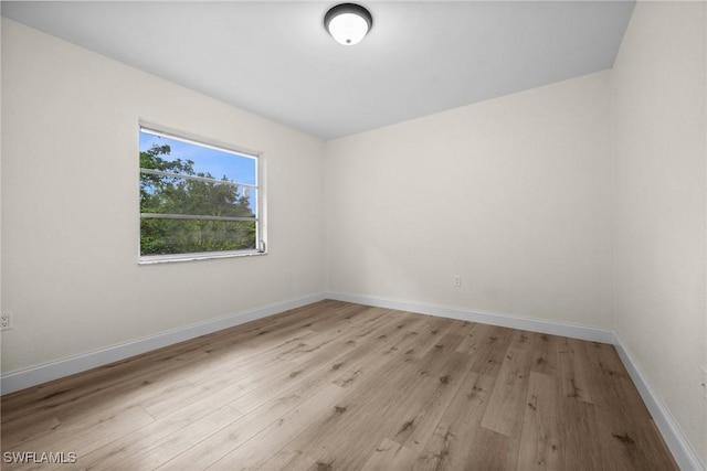 empty room with light wood-type flooring