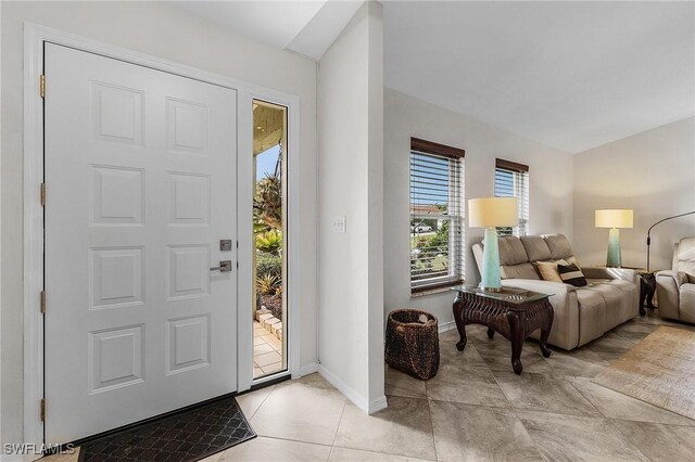 view of tiled foyer entrance