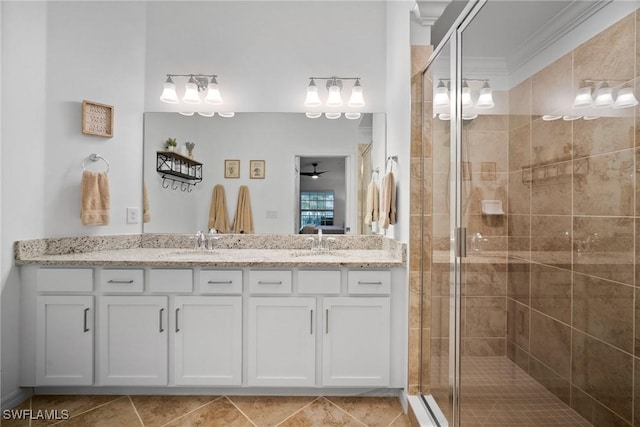 bathroom featuring ceiling fan, tile patterned flooring, vanity, and walk in shower