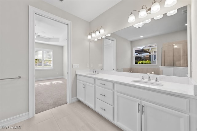 bathroom with vanity, tile patterned floors, and ceiling fan