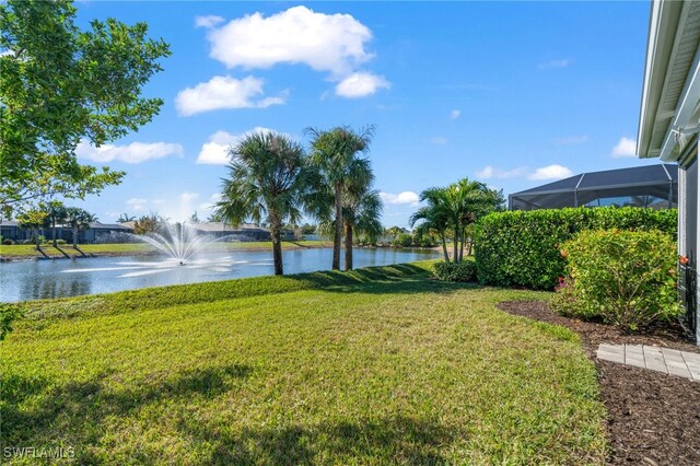 16522 Crescent Beach Way, Bonita Springs, FL 34135 - view of grassy yard featuring a water view