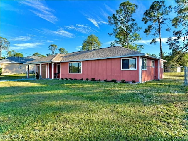 view of property exterior with a lawn