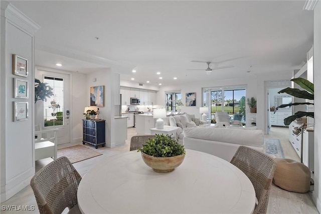 dining space featuring ceiling fan