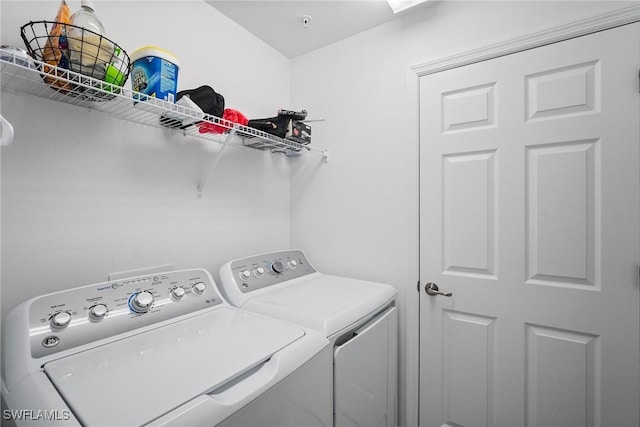 laundry area with washer and clothes dryer