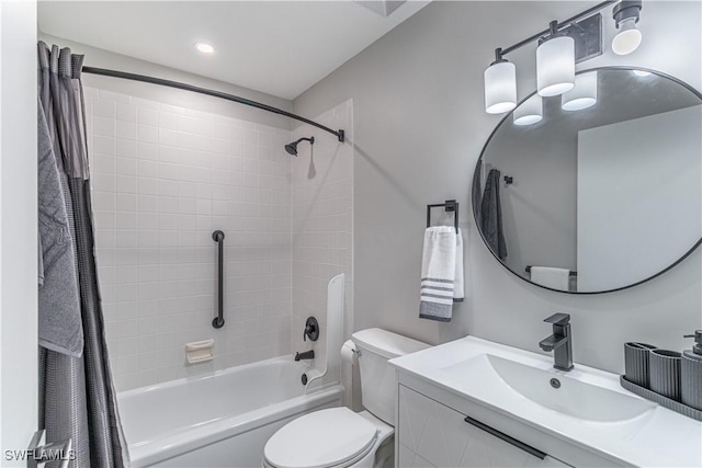 full bathroom with vanity, toilet, and shower / bath combo with shower curtain