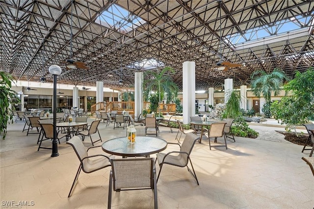 view of patio / terrace featuring ceiling fan