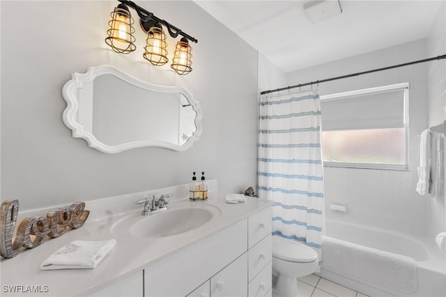 full bathroom featuring tile patterned flooring, vanity, toilet, and shower / bath combo with shower curtain