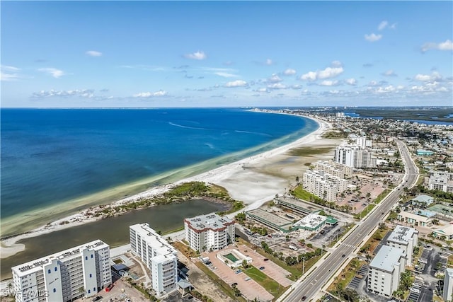 aerial view featuring a water view and a beach view