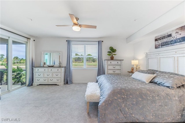 bedroom featuring access to exterior, ceiling fan, and light carpet