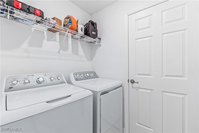 laundry area featuring separate washer and dryer