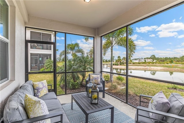 sunroom with a water view