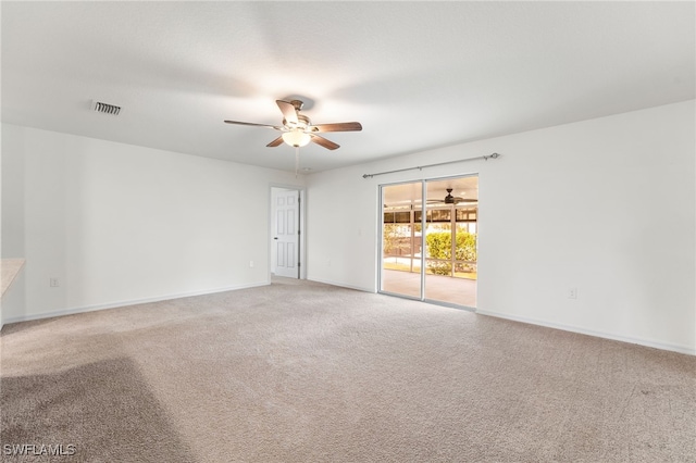 spare room featuring carpet flooring