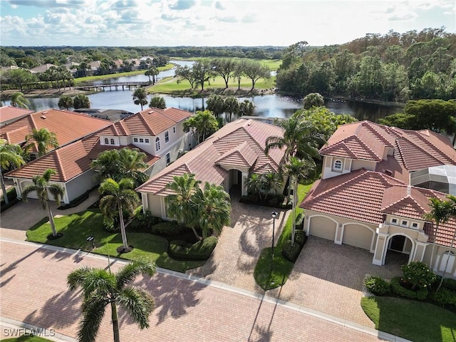 drone / aerial view with a water view