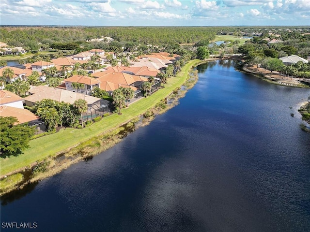 drone / aerial view with a water view