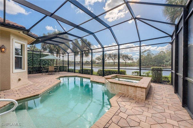 view of pool with a lanai, a patio area, an in ground hot tub, and a water view