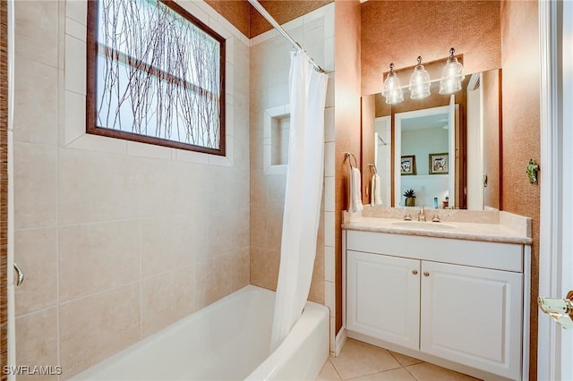 bathroom featuring tile patterned flooring, vanity, and shower / bathtub combination with curtain