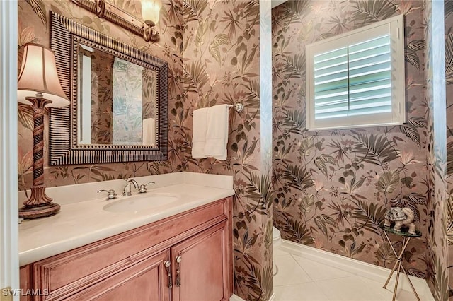 bathroom featuring tile patterned floors, vanity, and toilet