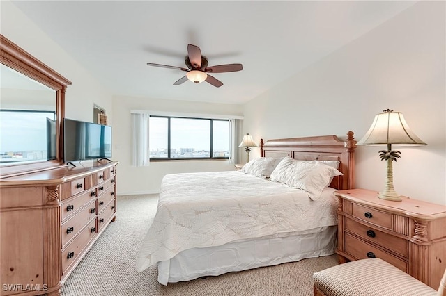 bedroom with light carpet and ceiling fan