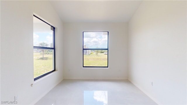 unfurnished room with a wealth of natural light