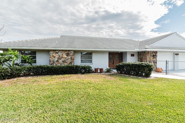 ranch-style house with a front yard