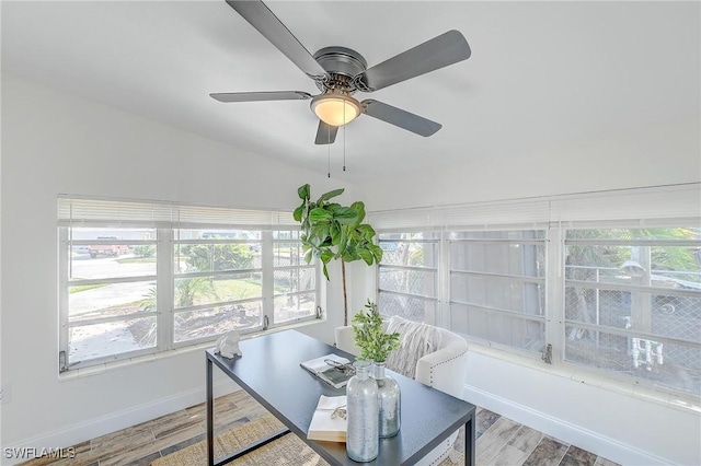 sunroom / solarium with ceiling fan