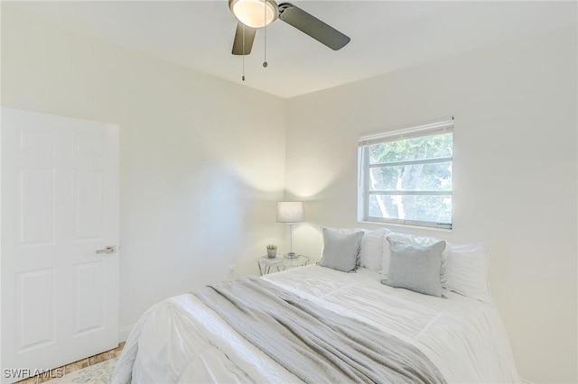 bedroom featuring ceiling fan