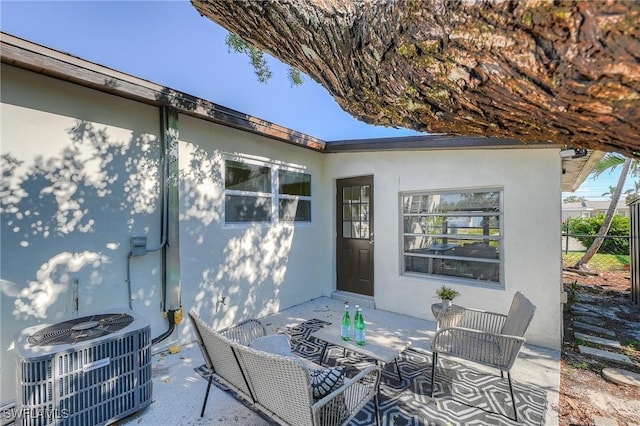 view of patio featuring central AC