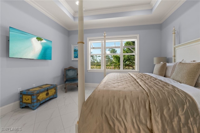 bedroom featuring a raised ceiling and crown molding