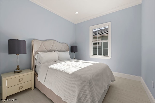 bedroom with crown molding