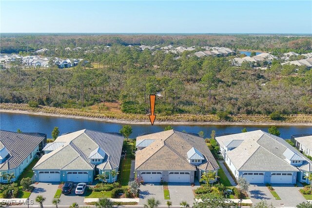 drone / aerial view featuring a water view