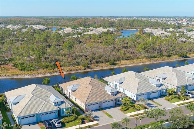 aerial view featuring a water view and a residential view