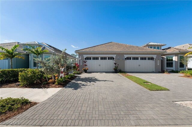 view of front of property with a garage