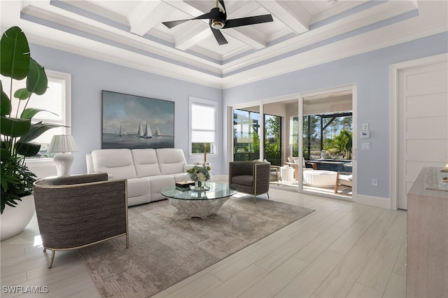 living room featuring beam ceiling, ceiling fan, and coffered ceiling