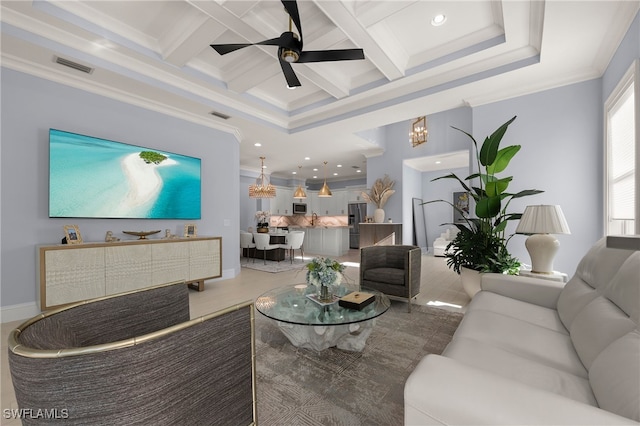 tiled living room with beamed ceiling, crown molding, ceiling fan, and coffered ceiling