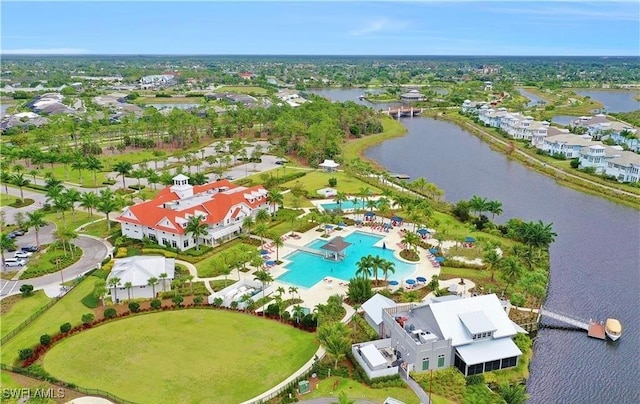 birds eye view of property featuring a water view