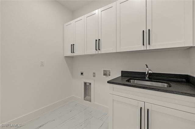 laundry room featuring washer hookup, electric dryer hookup, cabinets, and sink