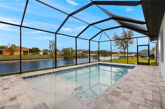 view of swimming pool featuring a lanai, a yard, a water view, and a patio