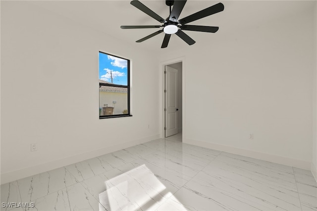 spare room featuring ceiling fan