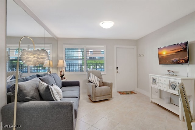 living room with light tile patterned floors