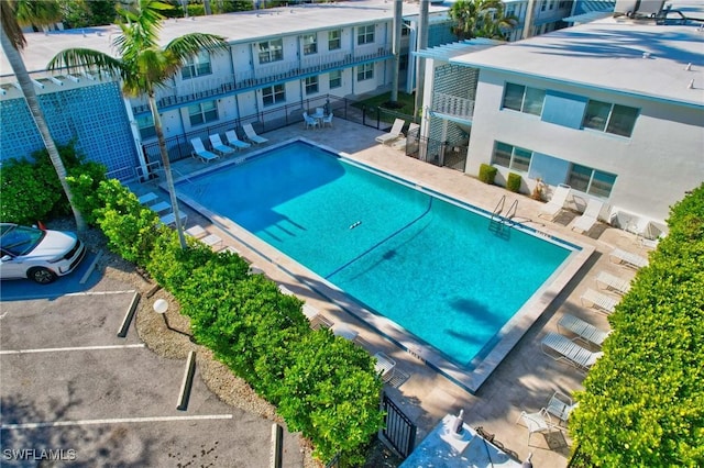 view of pool featuring a patio area